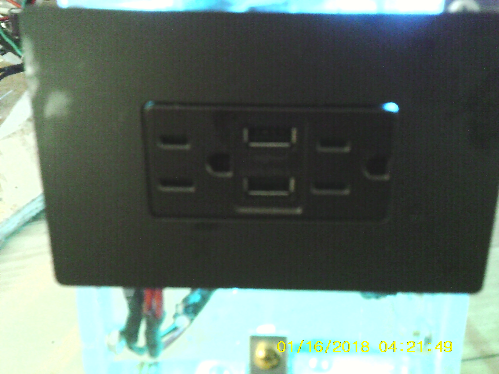 110 volt plug with usb charge ports good pic.